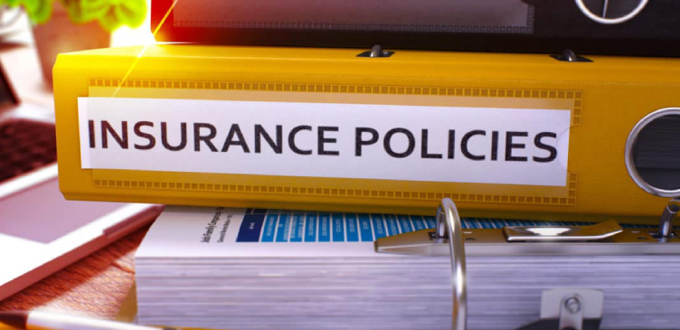 Image Showing An Insurance Policy Book Placed On A Table.