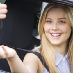 Young Attractive Smiling Woman bought a key.