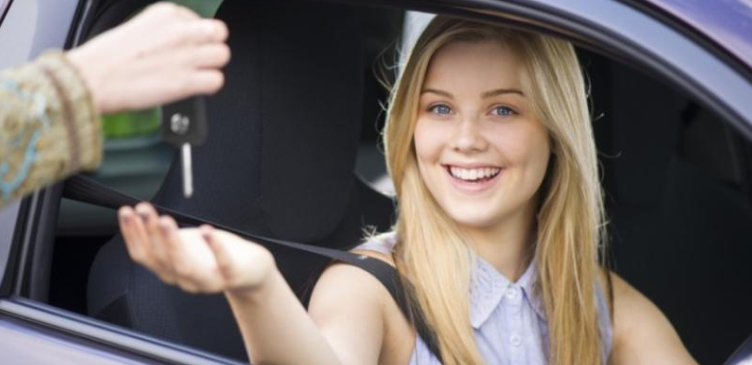 Young Attractive Smiling Woman bought a key.