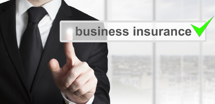 A Business man pointing on business insurance on the screen.