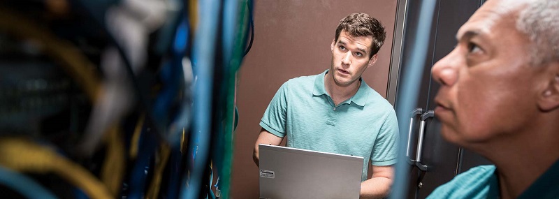 An employee of the telecom company describing to an insurance agent the damage to the workstation